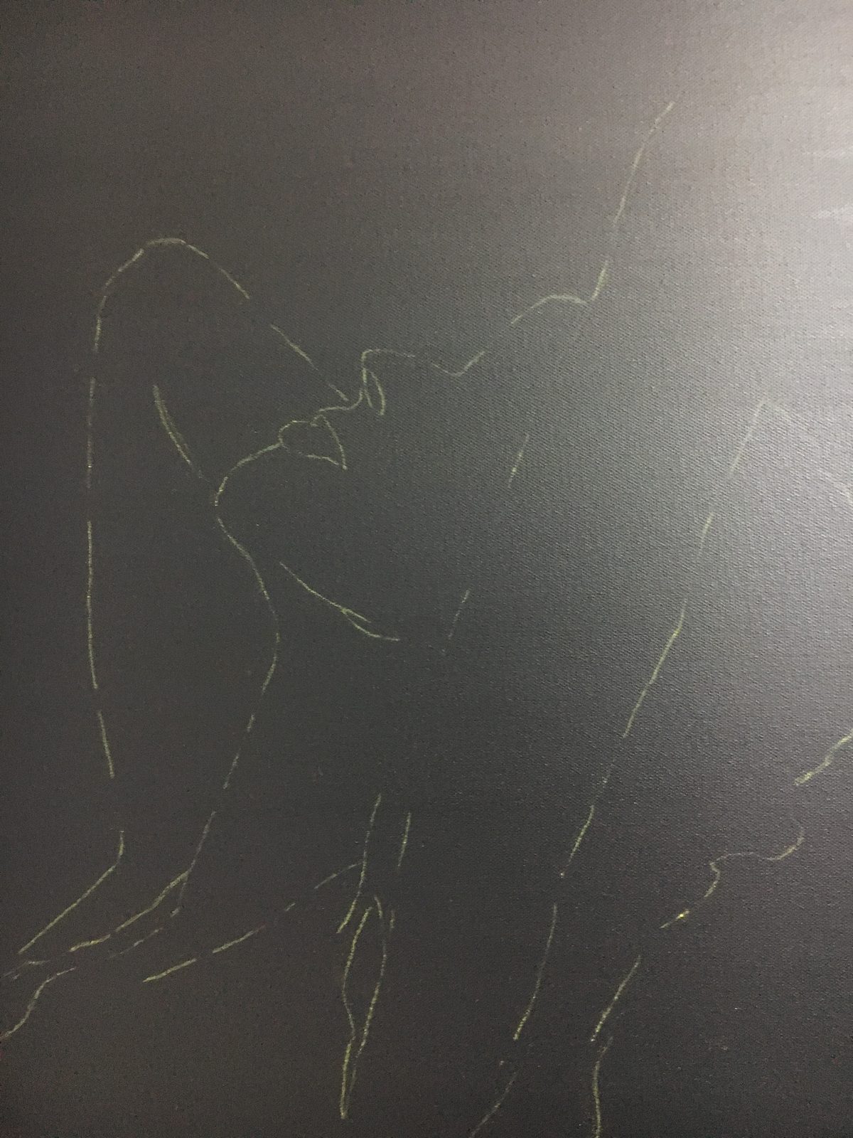 First lines of a figure on a dark canvas