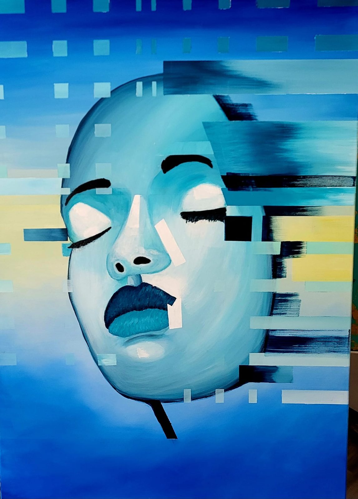 A woman’s face in fragmented blues